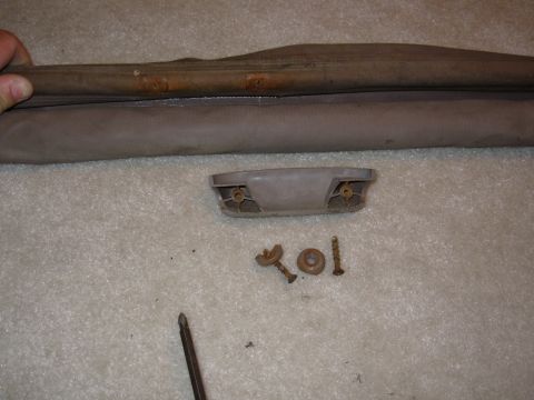 1983 Ford Bronco - Remove the handle & work the draw rod to free it from the plastic so it slides.