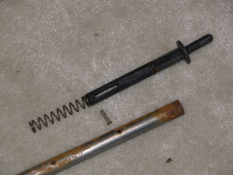 1983 Ford Bronco - Work the catch pin out without tearing the O-rings, and slide the draw rod out of the cover. Then IF NECESSARY, remove the other catch pin'…