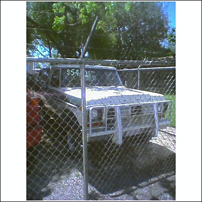 1979 Ford Bronco - This 1979 Ford Bronco is seen from the front, a brush guard and a price tag on the windshield.