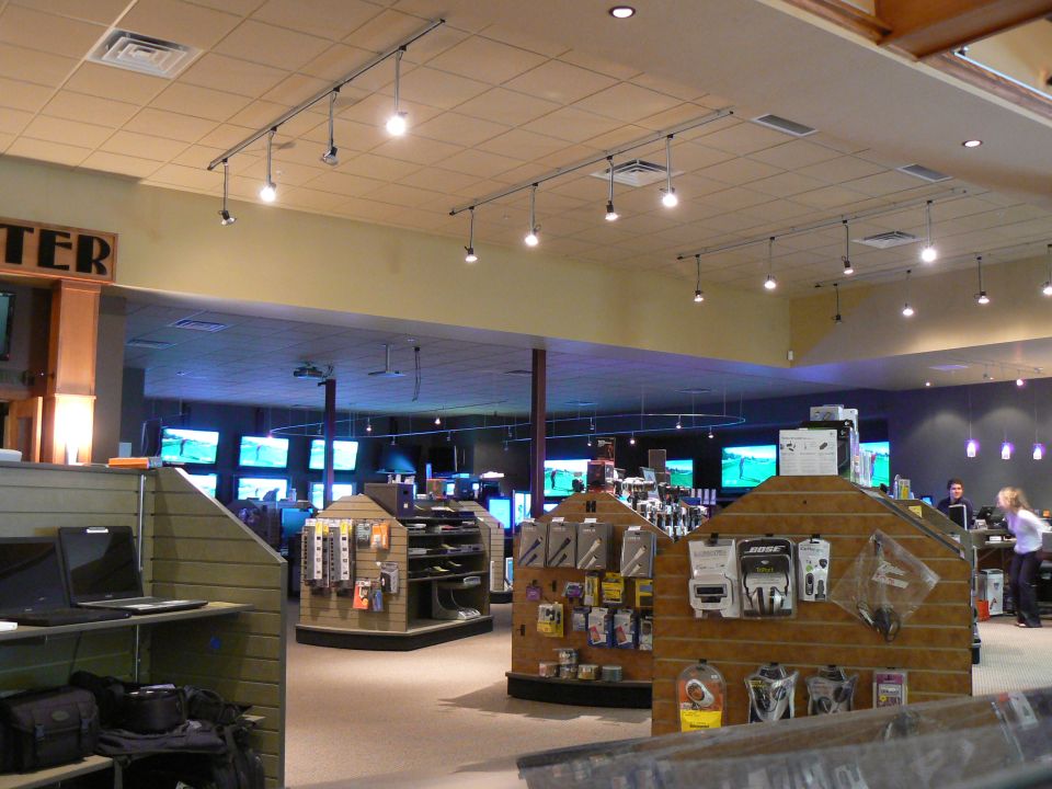 Interior of an electronics store with product displays