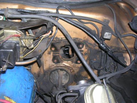 1975 Ford Ranchero - Close-up of engine bay wiring and components, including a brake fluid reservoir.