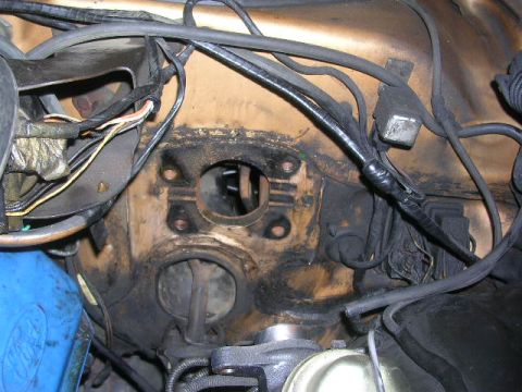 1975 Ford Ranchero - This image shows the firewall area of a vehicle, with numerous wires and mechanical parts.