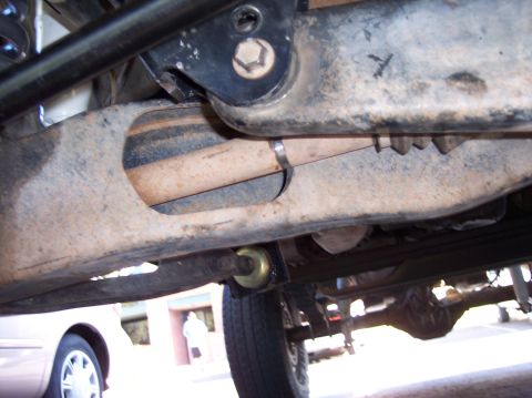 1996 Ford Bronco - Undercarriage view of a 1996 Ford Bronco, showing the rear axle and suspension.