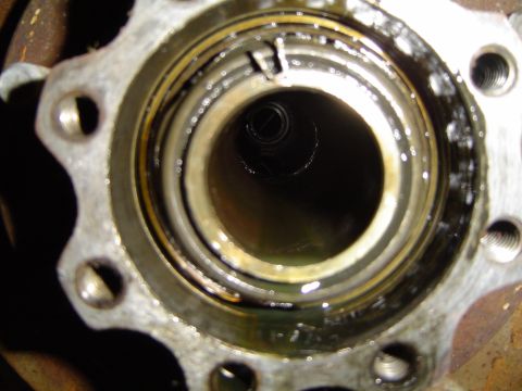 1978 Ford Bronco - A close-up view of a Dana 70 FF axle hub, showing internal components and signs of use.