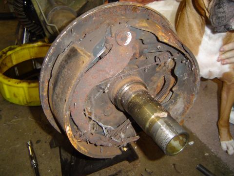 1978 Ford Bronco - Close-up of a rusty brake drum assembly, likely from an older vehicle.