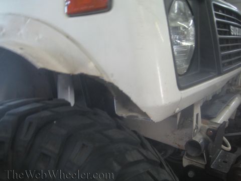 1987 Suzuki Samurai - Front fender of a 1987 Suzuki Samurai modified for larger tires.