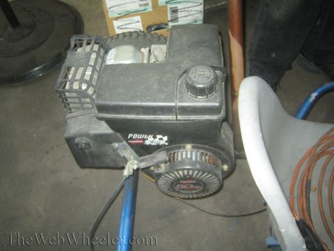 1987 Suzuki Samurai - A black Power-Seal engine with a 5.0 HP rating is mounted on a blue frame.