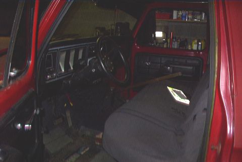 1979 Ford F-150 - Interior view of a red 1979 Ford F-150 pickup truck.