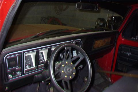 1979 Ford F-150 - The interior of a 1979 Ford F-150 shows its dashboard, steering wheel, and door panel details.