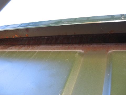 1973 Ford Ranchero - Detail of a rusted seam, likely from a vehicle's undercarriage or body panel.