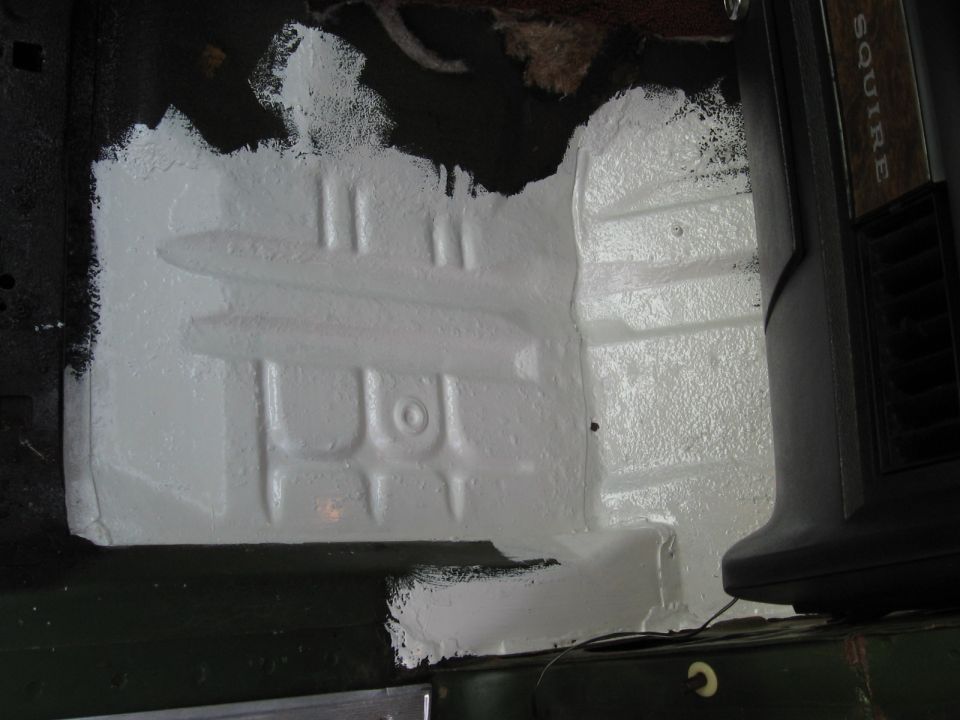 Painted floor pan interior with "Squire" trim visible