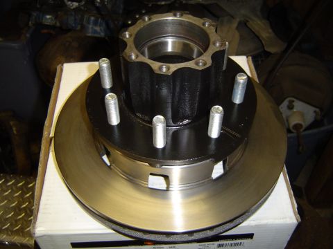 1978 Ford Bronco - Dana 70 FF hub and rotor assembly shown in a workshop setting.