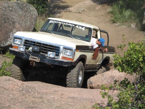 1979 Ford Bronco - This 1979 Ford Bronco navigates a rocky trail, its off-road capabilities.