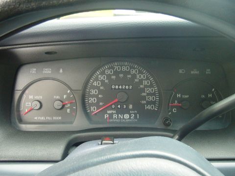 2002 Ford Crown Victoria - Interior view of a vehicle's dashboard gauges, showing the speedometer and other indicators.