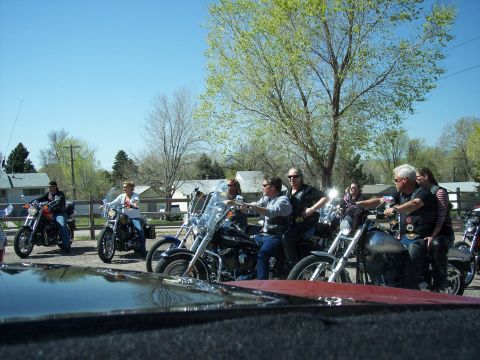 1972 Ford Ranchero - Several motorcycles and their riders are gathered outdoors on a sunny day.
