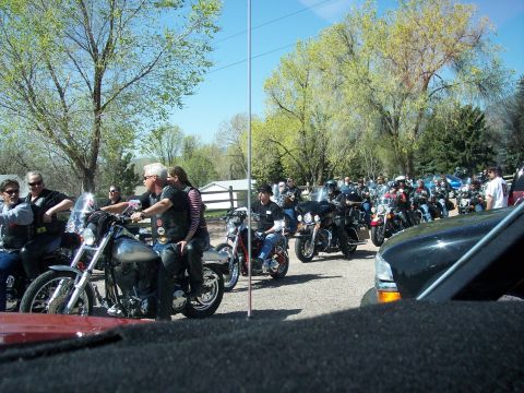 1972 Ford Ranchero - A group of motorcyclists are gathered for a poker run event, with many bikes lined up.