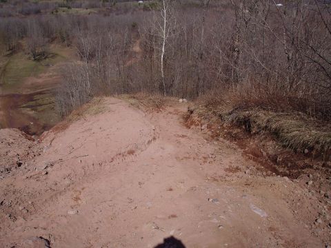 2000 Chevrolet Tahoe - Dirt path on a hill with trees. Supermotors logo visible.