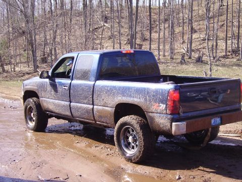 2000 Chevrolet Tahoe - This pickup truck appears to be a Chevrolet Silverado from the early 2000s, not a Tahoe.
