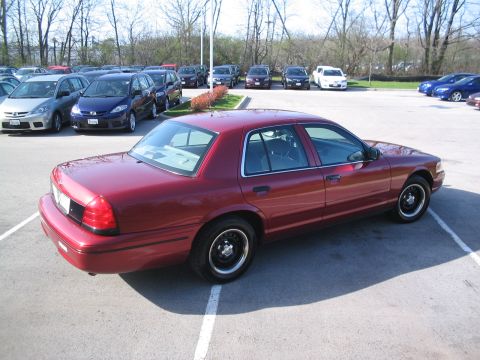 2001 Ford Crown Victoria - This 2001 Ford Crown Victoria is seen from a 3q-front angle in a parking lot.