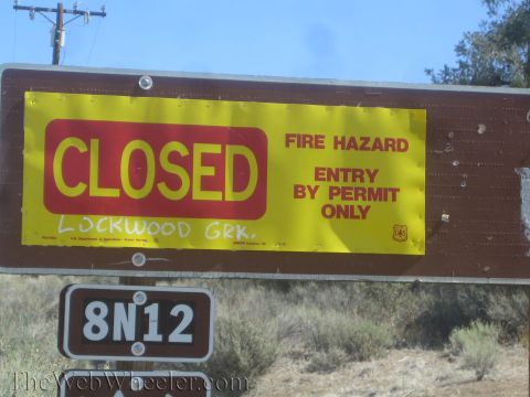 1987 Suzuki Samurai - Sign indicates Lockwood Grk. is closed due to fire hazard, requiring a permit for entry.