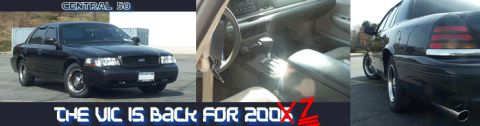 1999 Ford Crown Victoria - Black Ford Crown Victoria, front quarter view, with interior and rear views.