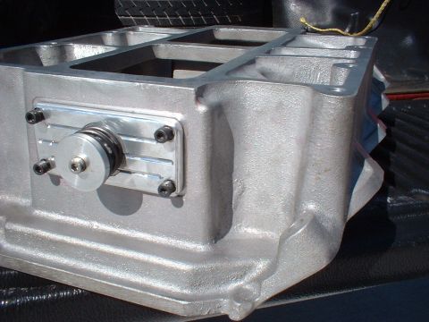 1964 Ford 427 - 1st blower manifold from Munro. Had to broach top of intake runners and fabricate and install pop-off plate.
