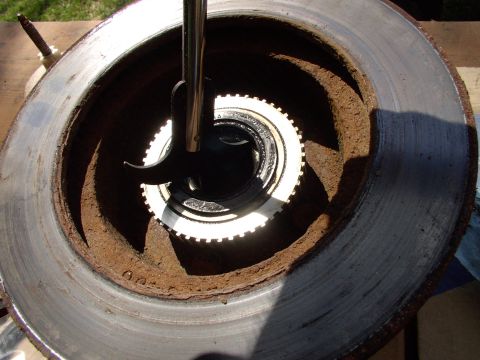 1990 Lincoln Town Car - Once you've pulled off the dust cover, removed the cotter pin and undone the bearing nut, the rotor comes off in your hands. Pry out the in…