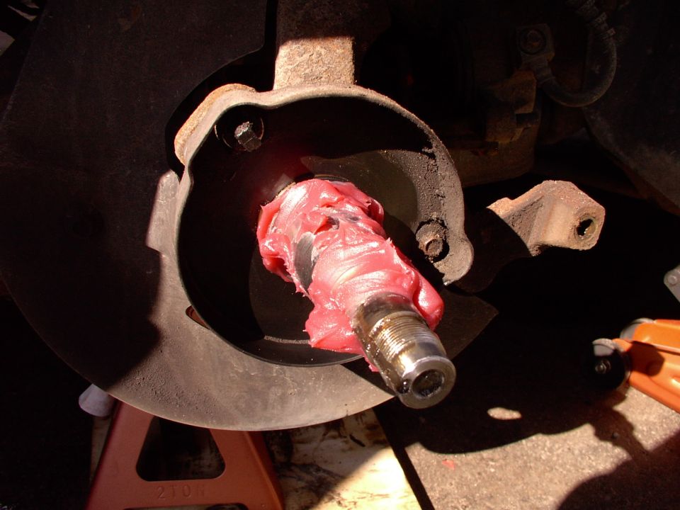 May as well lube up the two spindle contact areas while you're at it too. I spend the extra dollar and get real fully synthetic grease. I can't prove it, but it feels like it rolls and glides better.