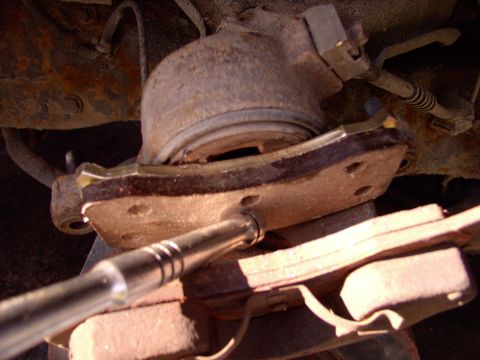 1990 Lincoln Town Car - Pop the spring loaded inner pad into place.