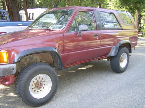 1986 Ford Bronco - This maroon 1984 Toyota 4Runner is shown from a 3q-front angle, equipped with off-road tires.