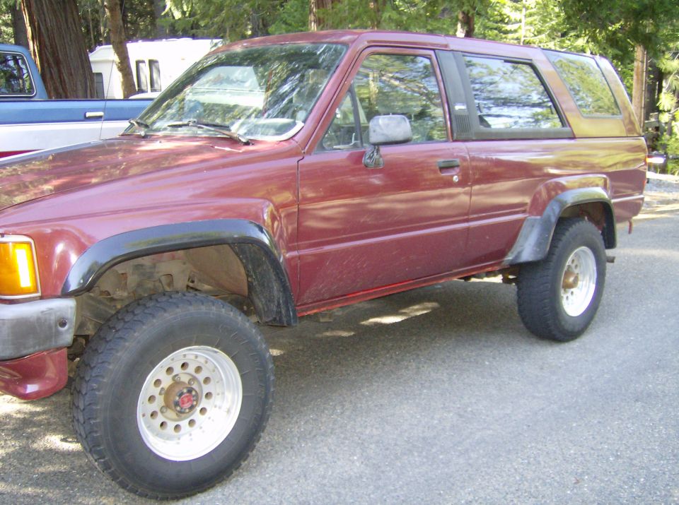Maroon 1984 Toyota 4Runner 3q-front view with off-road tires