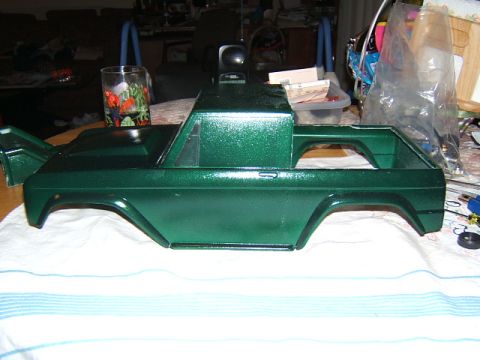 1988 Ford Bronco - This is a custom painted RC car body, likely for a truck or SUV, resting on a cloth.