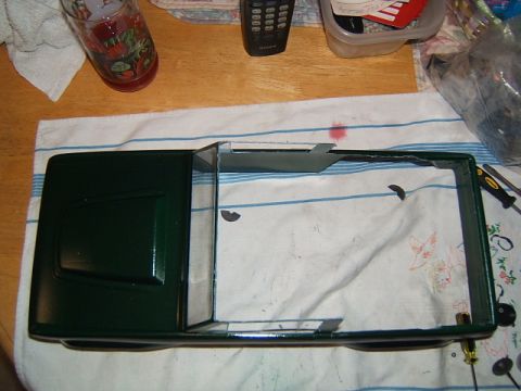 1988 Ford Bronco - The body of a model car sits on a striped cloth, awaiting further assembly or modification.