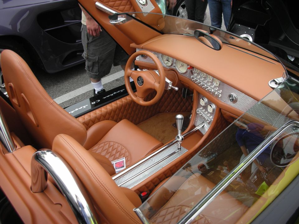 Tan leather Spyker cockpit with aluminum aircraft-style controls