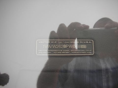 1998 Ford Crown Victoria - metal manufacturer data plate reads Vector W-8 Twin Turbo, Made in USA, with VIN and Vector Aeromotive Corp details.