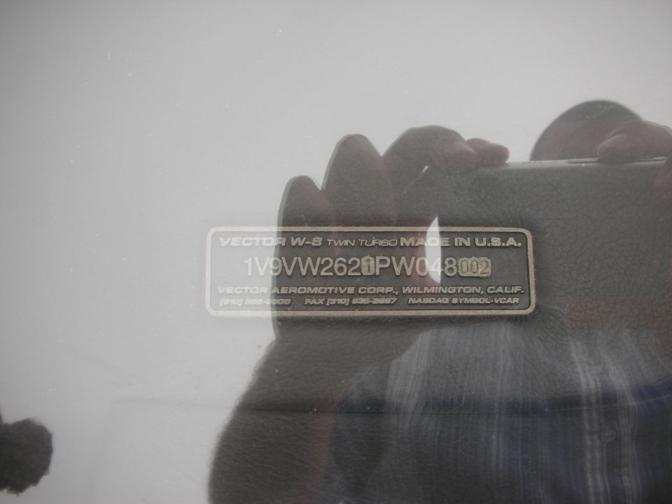 Metal Vector W-8 twin-turbo VIN data plate visible through glass