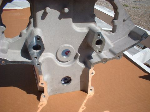 1964 Ford 427 - Engine block part shown with mounting holes and a circular sticker.
