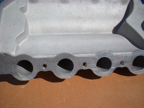 1964 Ford 427 - Close-up view of an aluminum intake manifold, showing its ports and construction.