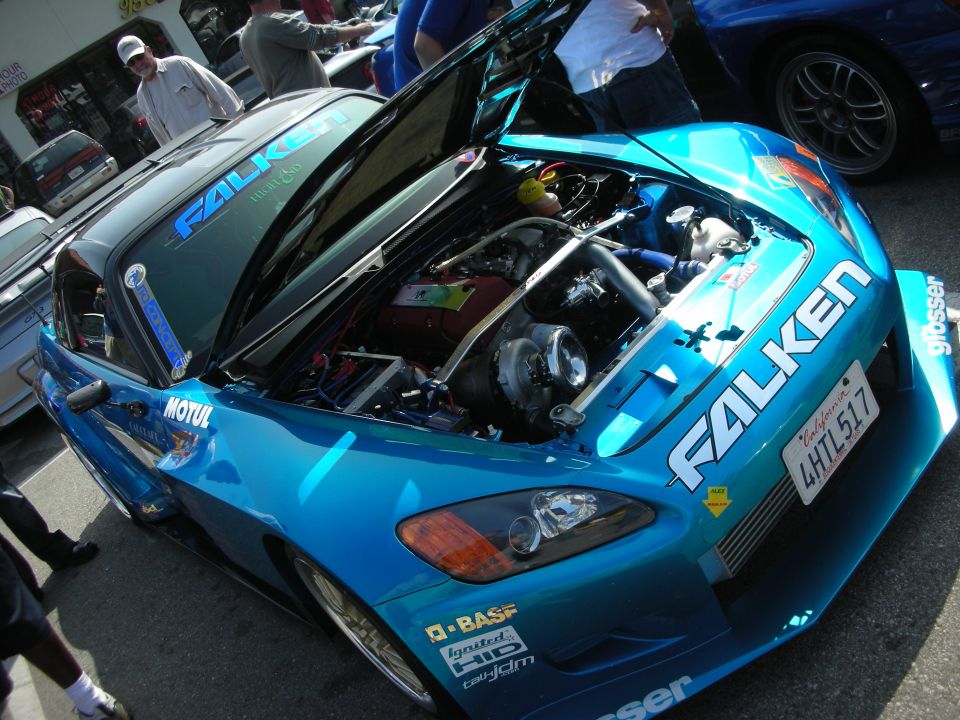 Teal Honda S2000 front quarter, hood up showing turbo engine and Falken livery
