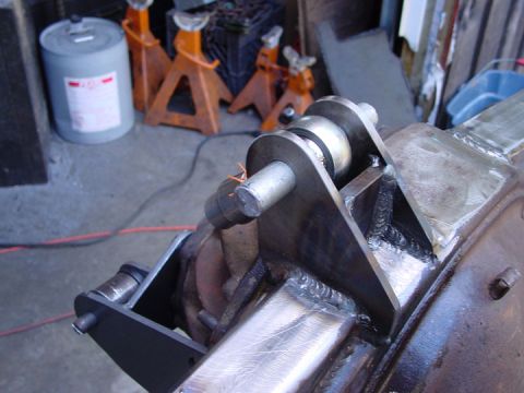 1979 Ford Bronco - Close-up view of a custom traction bar mount assembly, likely for a performance vehicle modification.