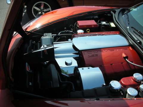 1998 Ford Crown Victoria - detailed Corvette engine bay with polished chrome covers and a red component visible beneath an open hood.