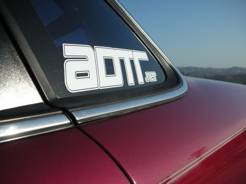 1992 Ford Crown Victoria - Close-up of a car's rear window with a prominent ADTR.net sticker.