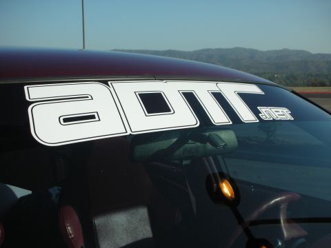 1992 Ford Crown Victoria - A large white banner with the text "ADTR.NET" is affixed to the top of the windshield.