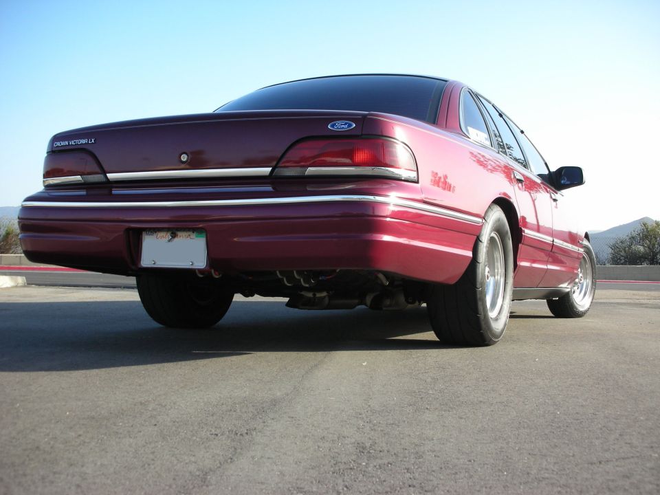 Maroon 1992 Ford Crown Victoria LX rear view, lowered suspension