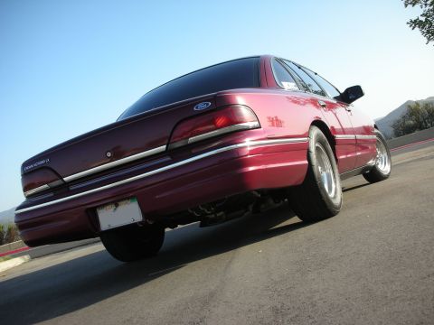 1992 Ford Crown Victoria - Rear view of a maroon 1992 Ford Crown Victoria LX, appearing to have lowered springs.