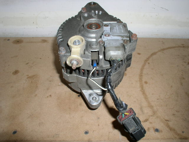 Alternator with wiring harness connector