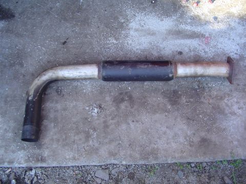 1994 Ford Probe - This is an exhaust pipe with a black muffler section, likely for a car or truck.