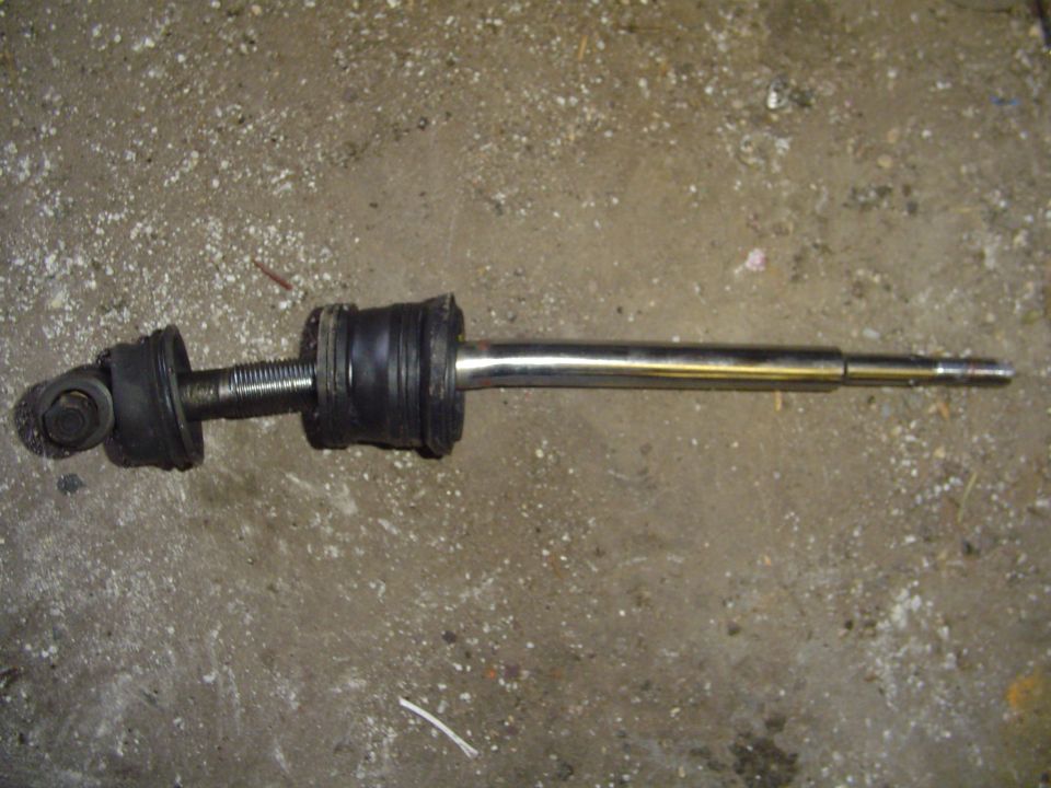 shift linkage rod with rubber bushings and threaded adjustment