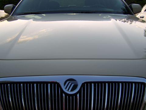 1996 Mercury Grand Marquis - Front view of a 1996 Mercury Grand Marquis, showing the grille and hood detail.