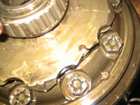 1990 Ford Bronco - This image shows damaged gear teeth within a differential housing, indicating a significant mechanical failure.